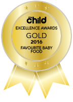 Happy baby wanting more biscuits