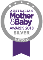 Happy baby wanting more biscuits