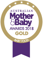 Happy baby wanting more biscuits