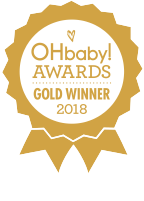 Happy baby wanting more biscuits