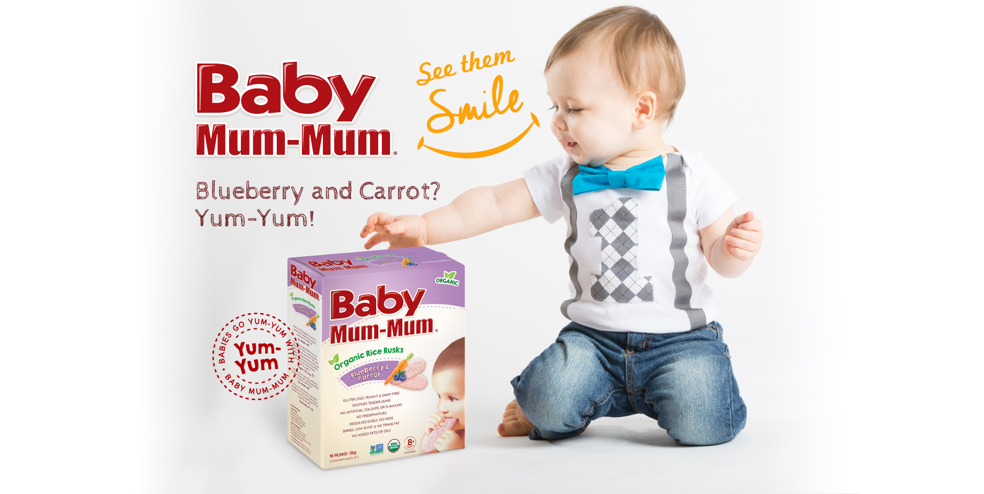 Happy baby wanting more biscuits