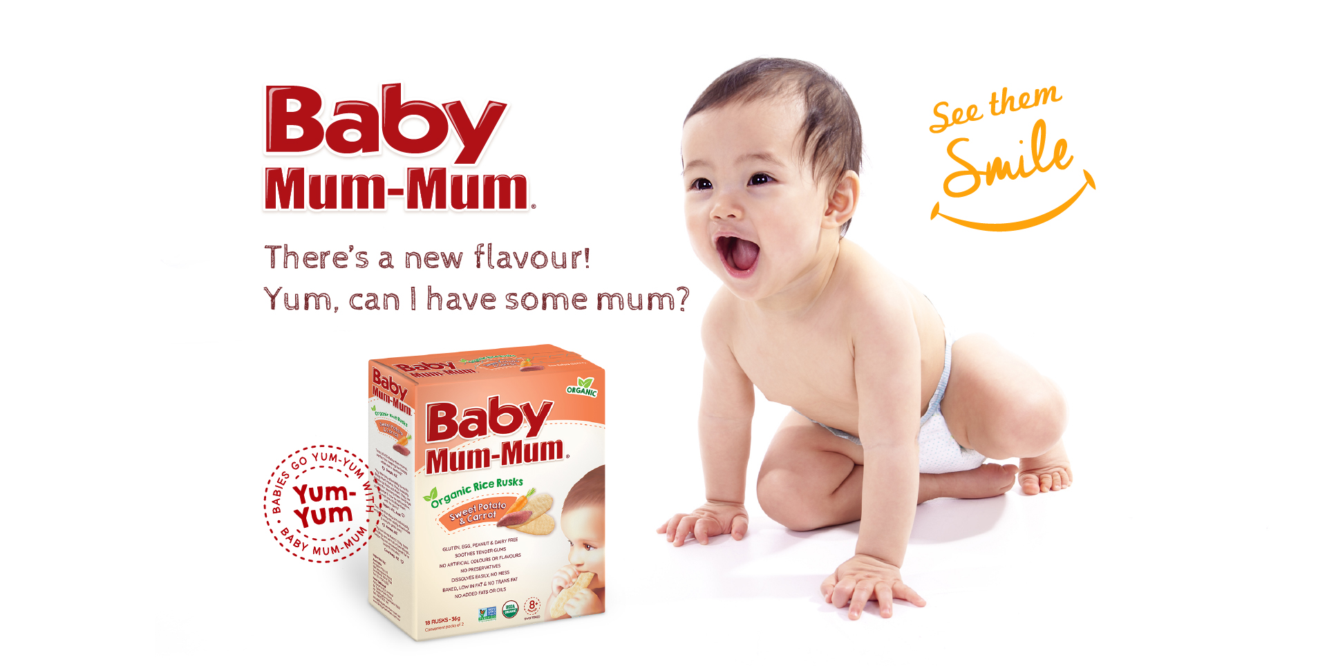 Happy baby wanting more biscuits